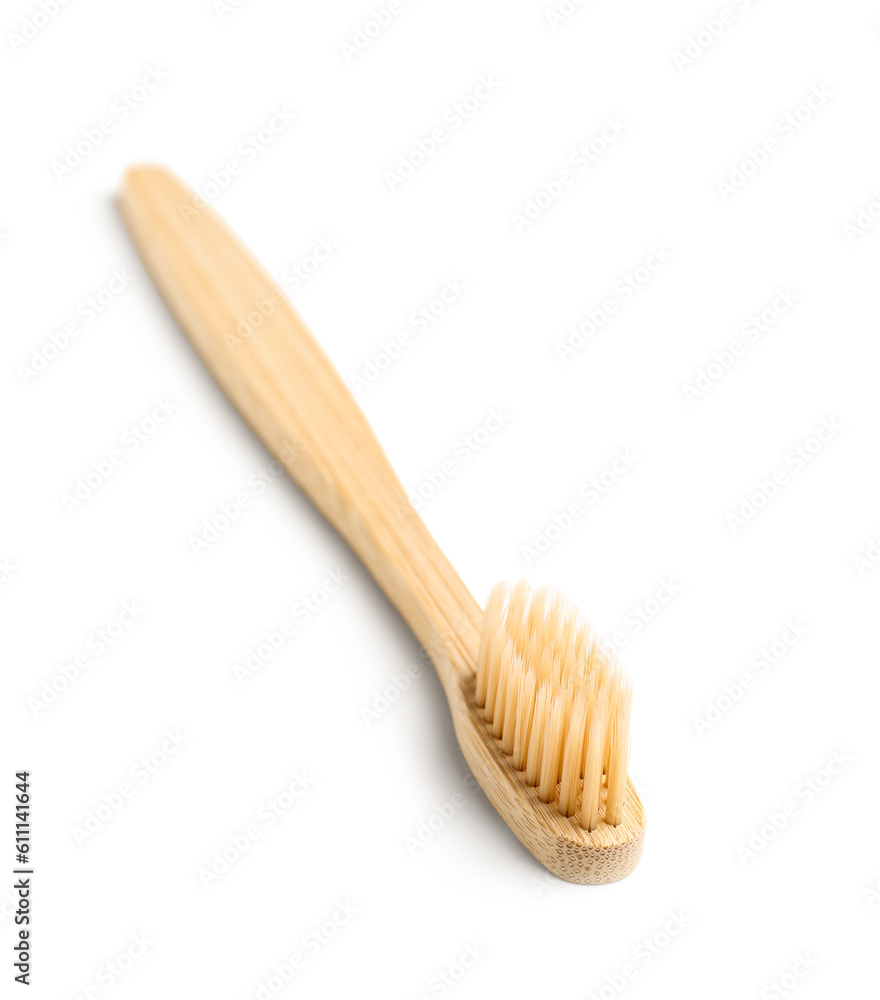 Bamboo toothbrush on white background