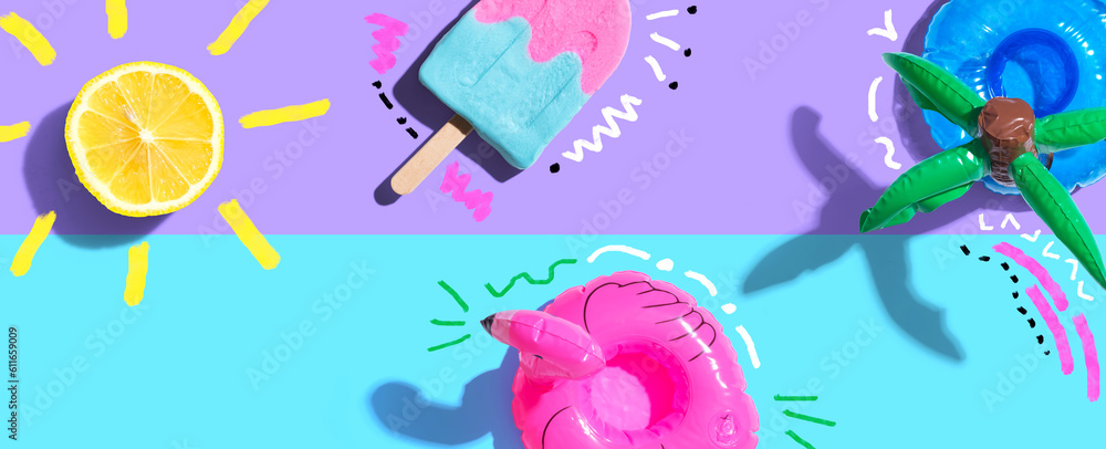 Summer concept with a flamingo float, lemon sunlight and a popsicle - flat lay