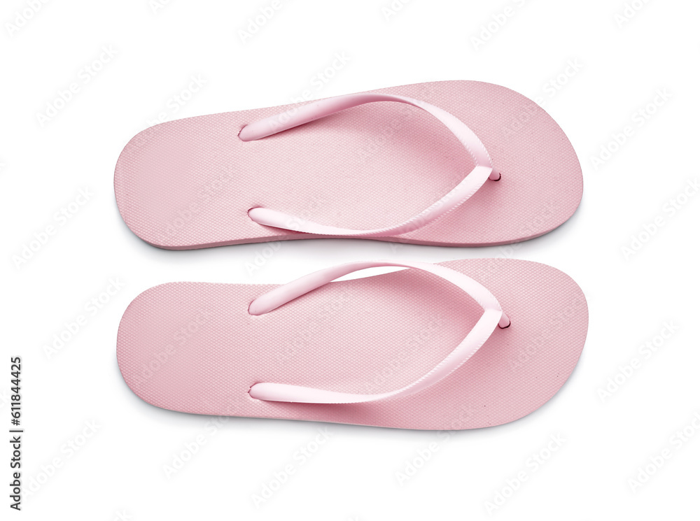 Pair of stylish pink flip-flops on white background