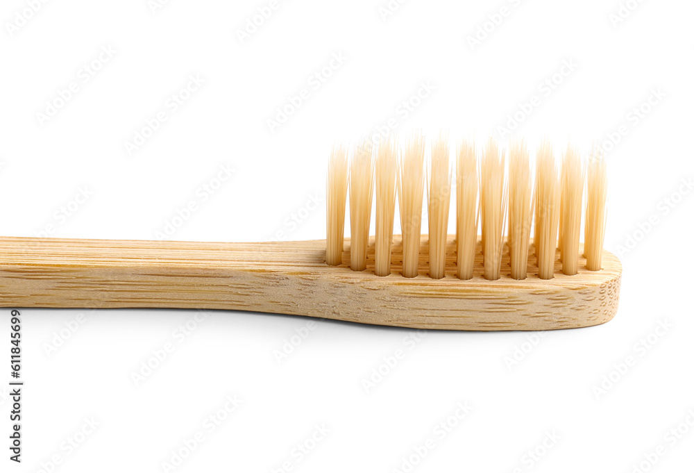 Bamboo toothbrush on white background