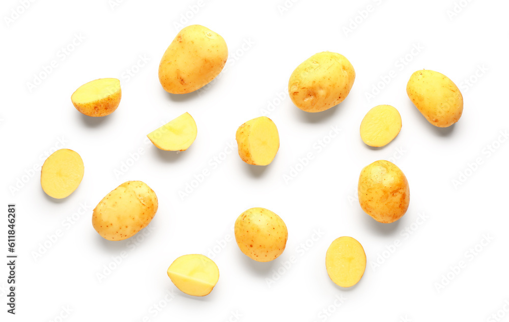 Slices of raw baby potatoes on white background