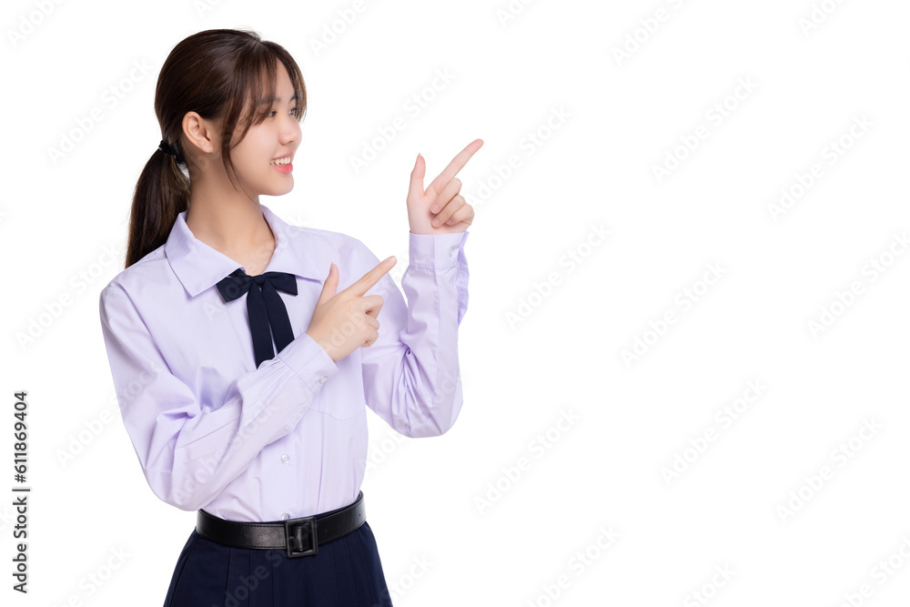 Happy Asian student girl in school uniform pointing finger to copy space isolated on transparent bac