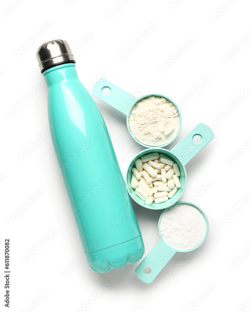 Bottle of water, amino acid pills and powder on white background