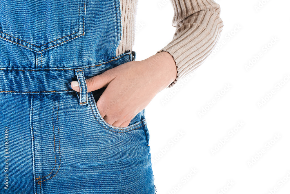 Young woman in denim jumpsuit on white background, closeup