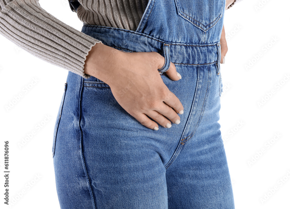 Young woman in denim jumpsuit on white background, closeup