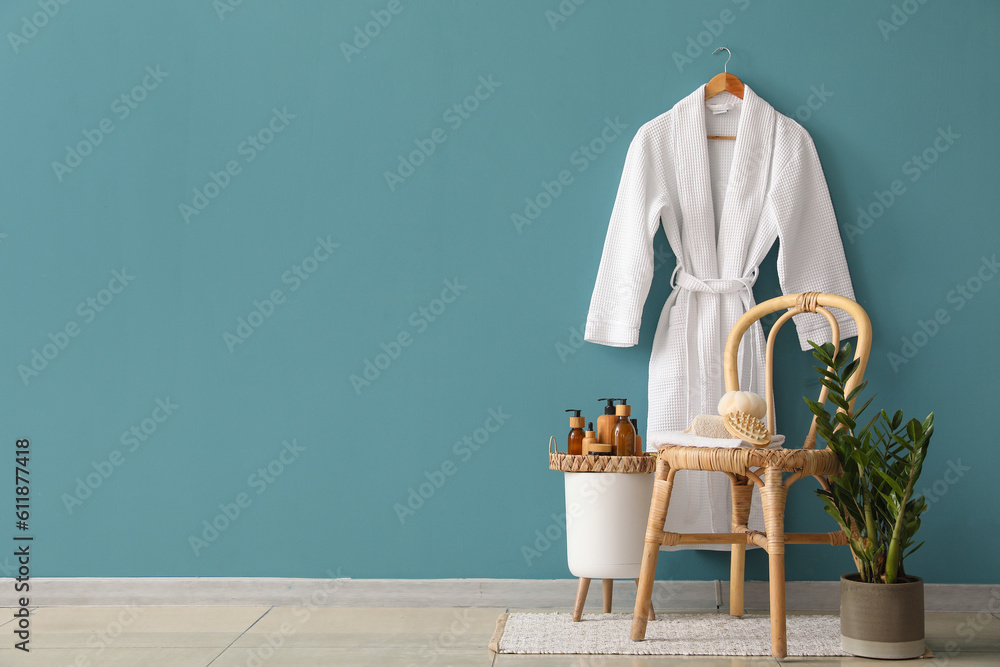 Interior of bathroom with stool, table and accessories