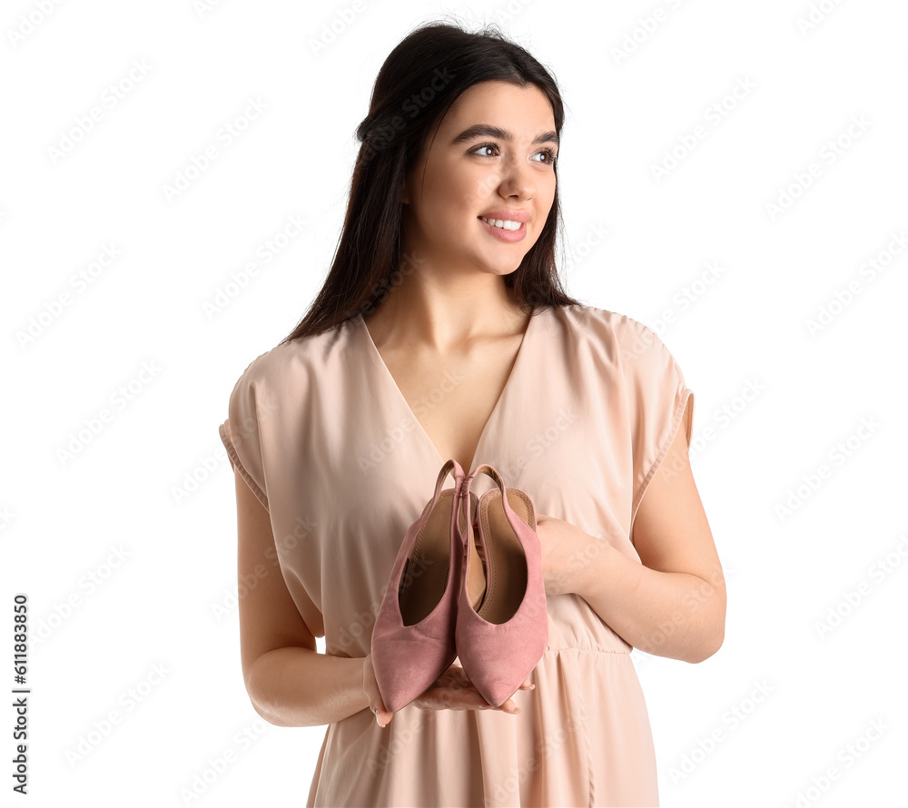 Young woman with stylish shoes on white background