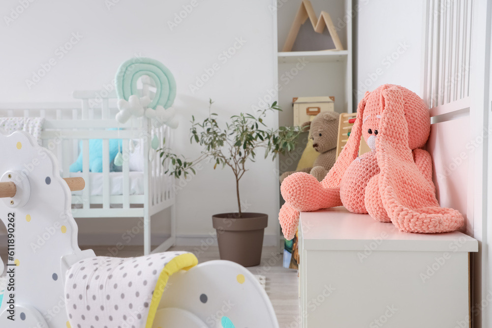 Different childrens toys in stylish room