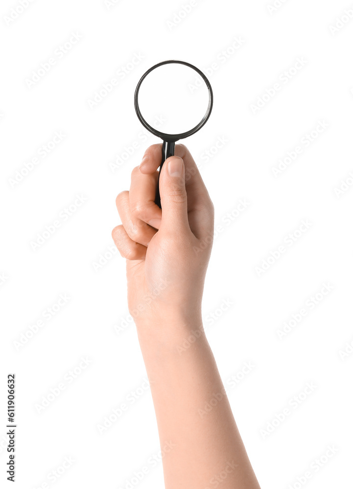 Female hand with mini magnifier isolated on white background