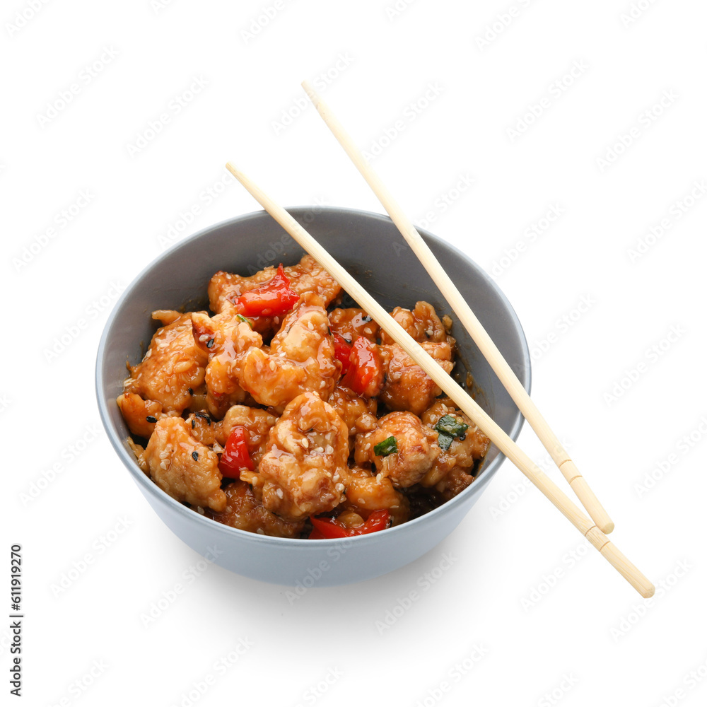 Bowl with tasty sweet and sour chicken on white background