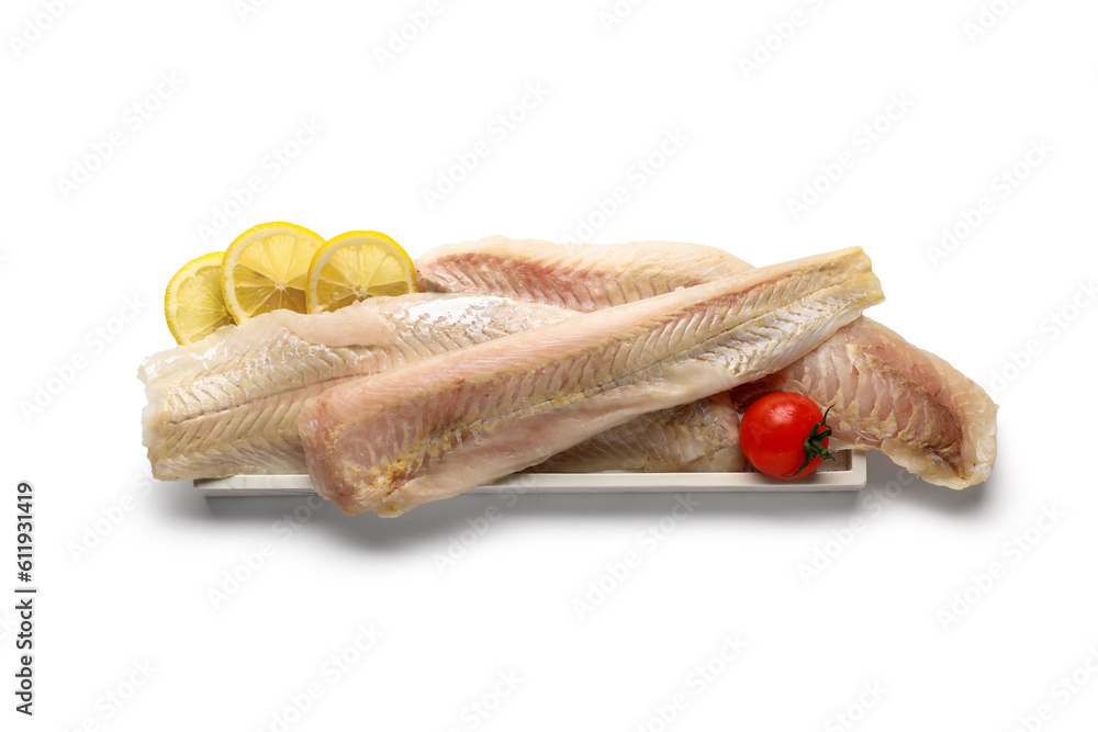 Plate of raw codfish fillet on white background