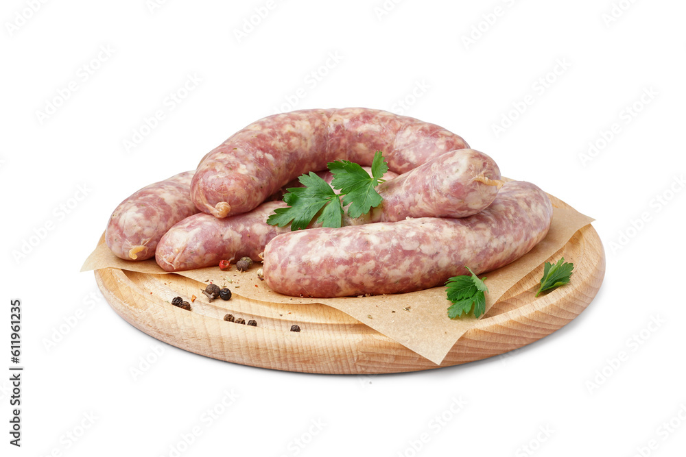 Board with raw fresh sausages and spices on white background