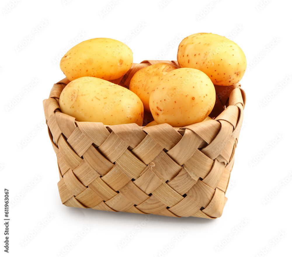 Wicker basket with raw baby potatoes on white background