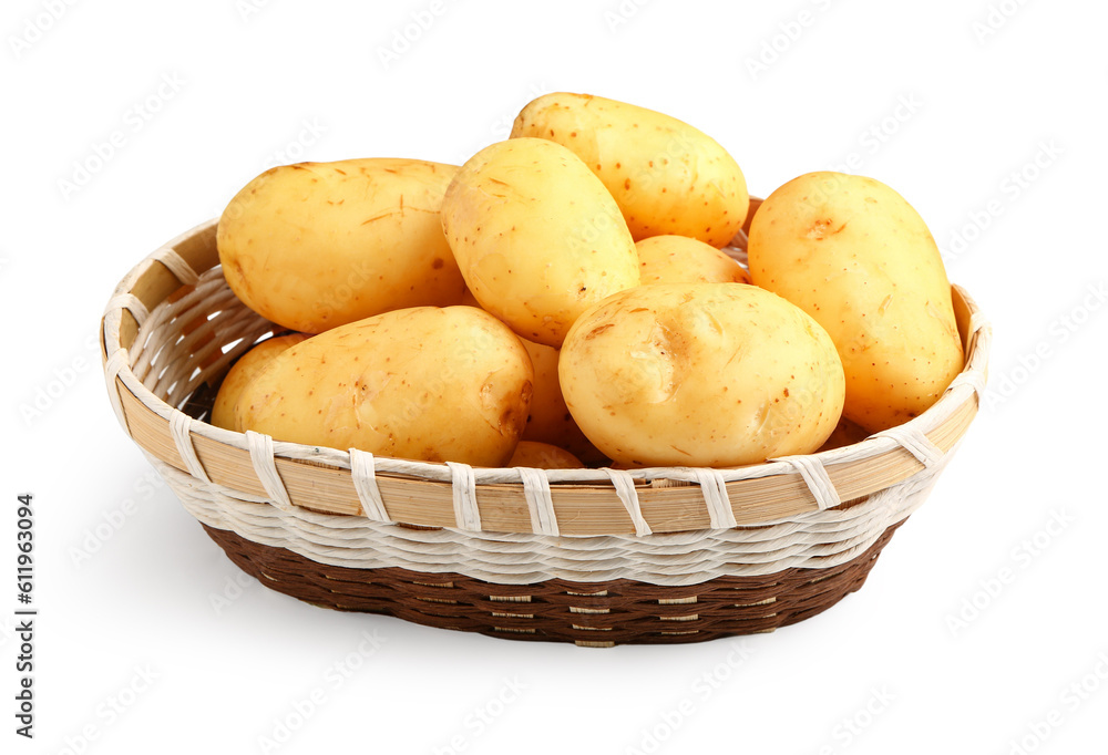 Wicker bowl with raw baby potatoes on white background