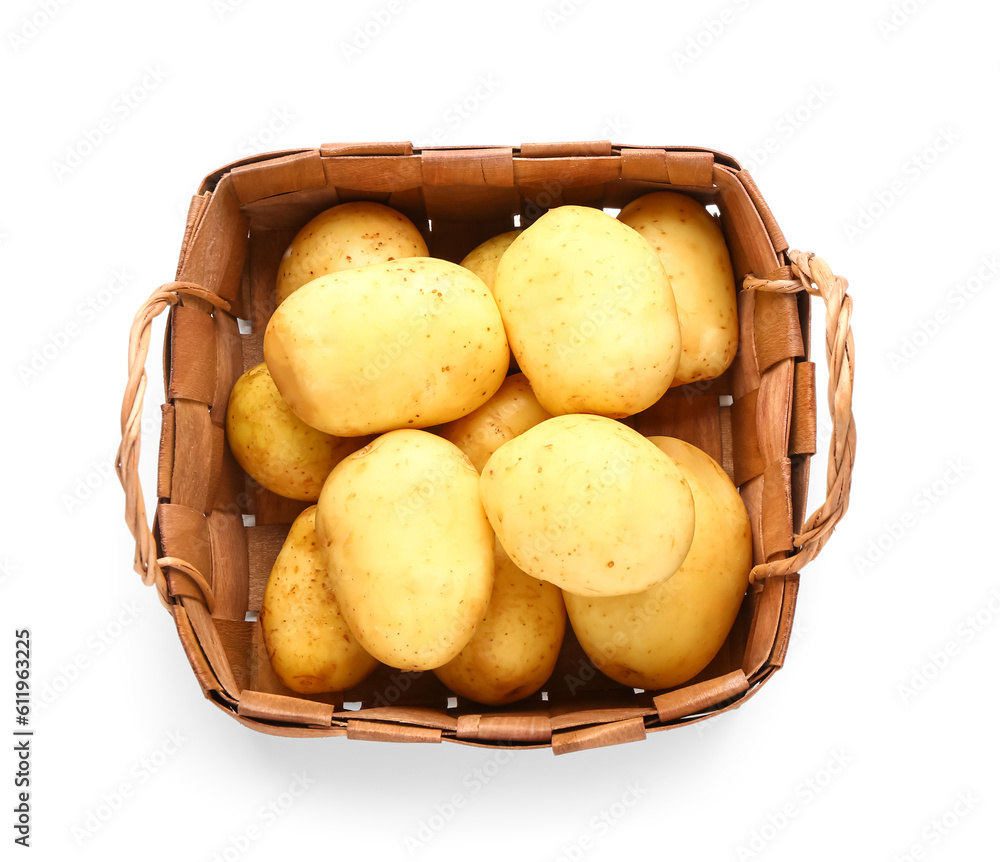 Wicker basket with raw baby potatoes on white background