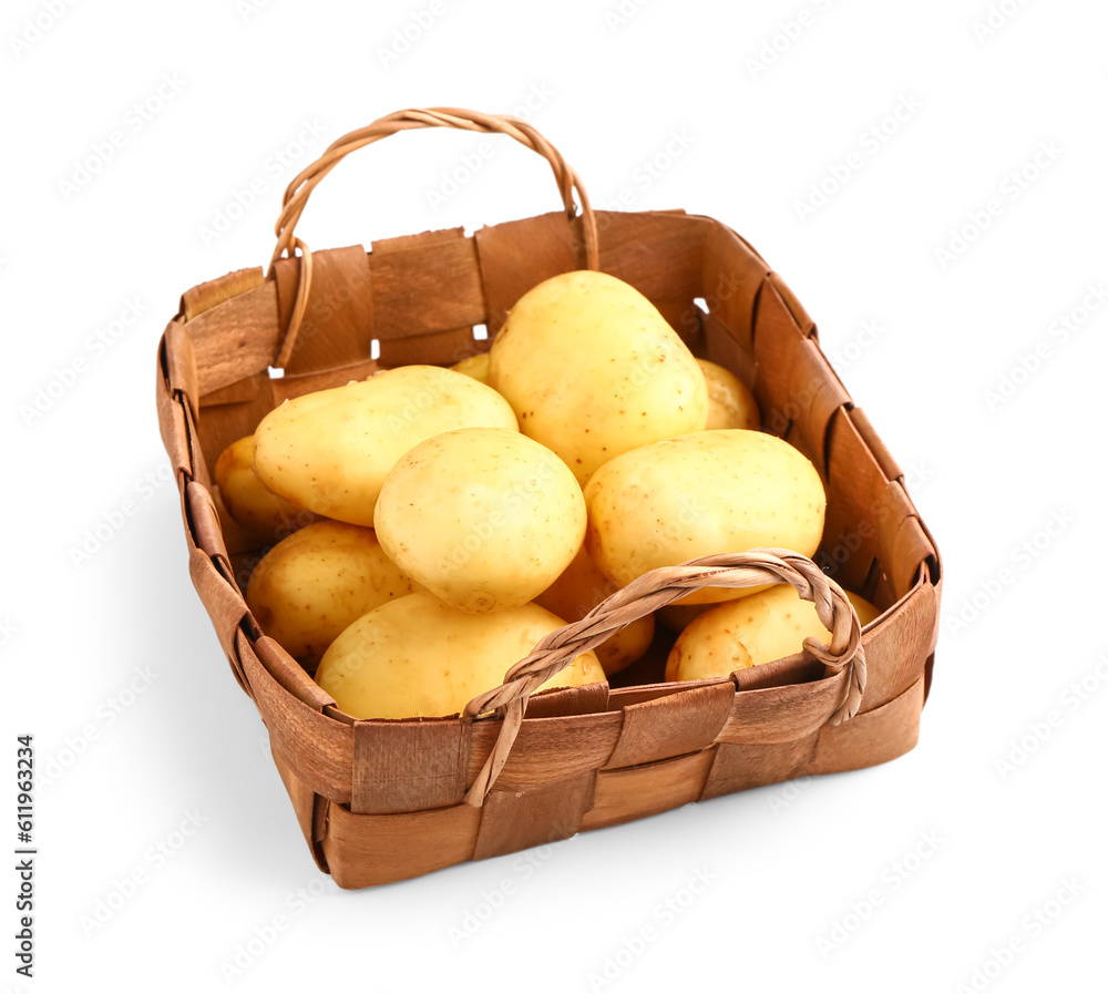 Wicker basket with raw baby potatoes on white background