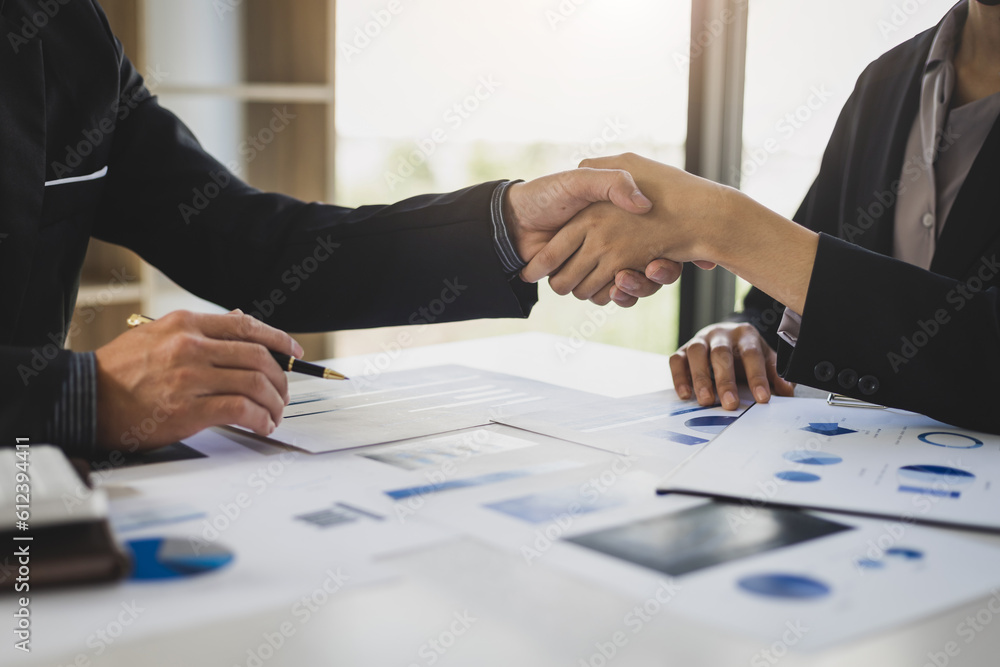 Handshake, Businessman shaking hands in a meeting and teamwork concept in business cooperation.