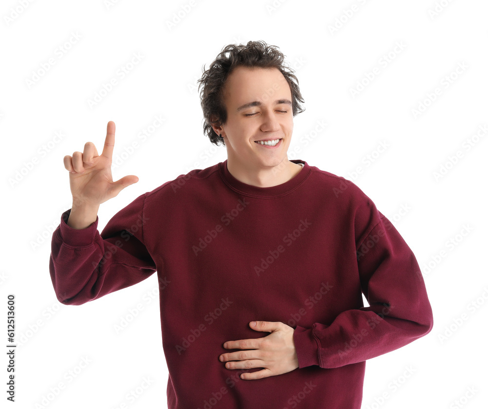 Young man showing loser gesture on white background