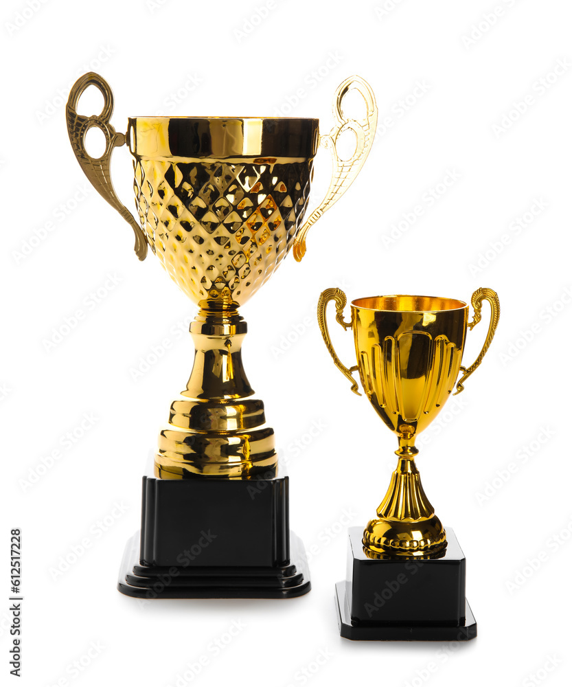 Gold cups on white background