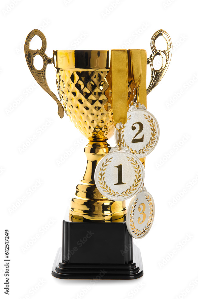 Gold cup with prize medals on white background