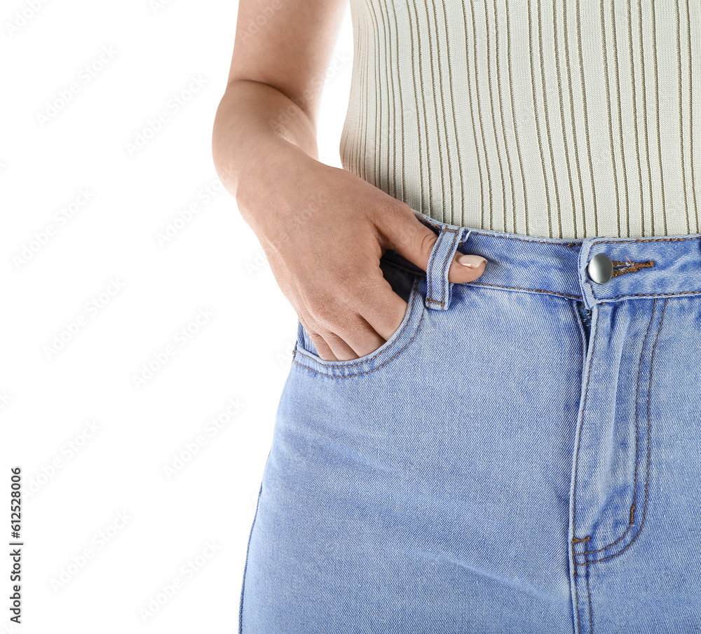 Young woman in stylish jeans on white background, closeup