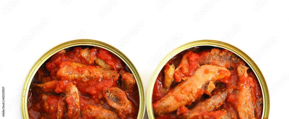 Opened tin cans with fish in tomato sauce isolated on white background