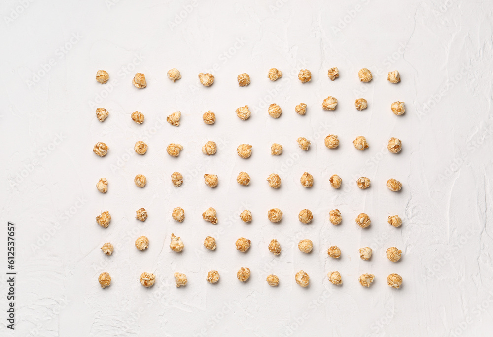 Crispy popcorn on light background