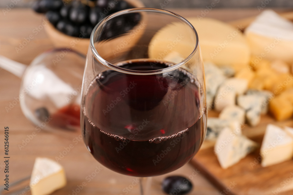 Glass of red wine on table, closeup