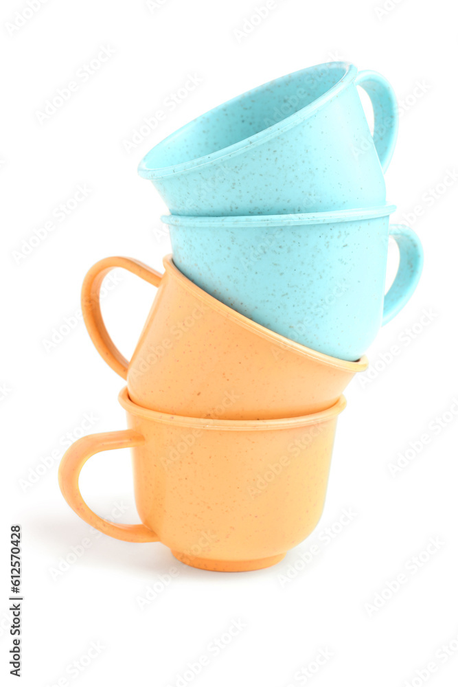 Colorful cups isolated on white background. Childrens Day celebration