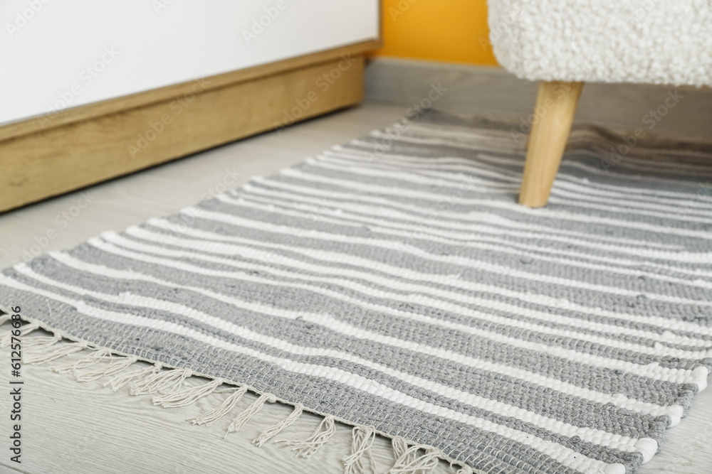 Soft rug on floor in living room, closeup