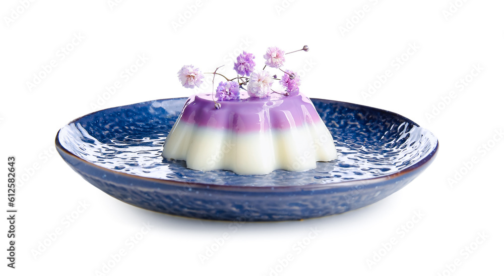 Plate of panna cotta with beautiful gypsophila flowers on white background