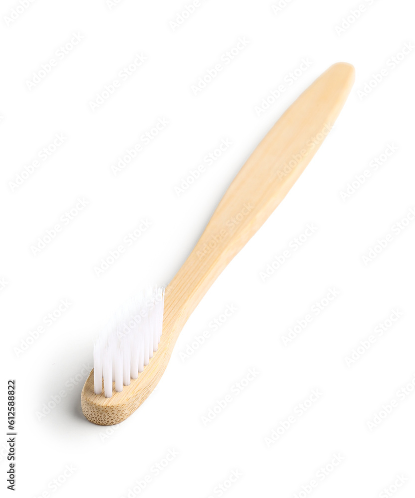 Bamboo toothbrush on white background