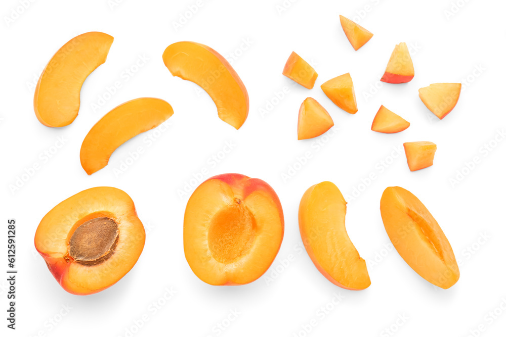 Composition with ripe apricots on white background