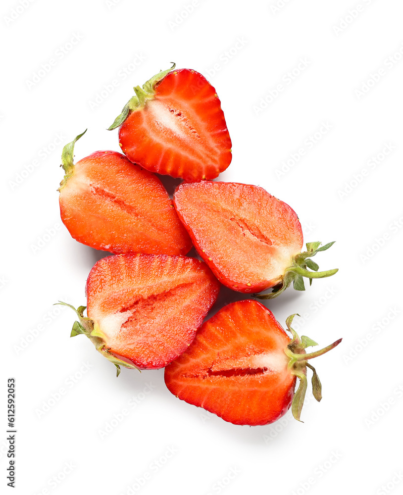 Halves of fresh strawberries on white background