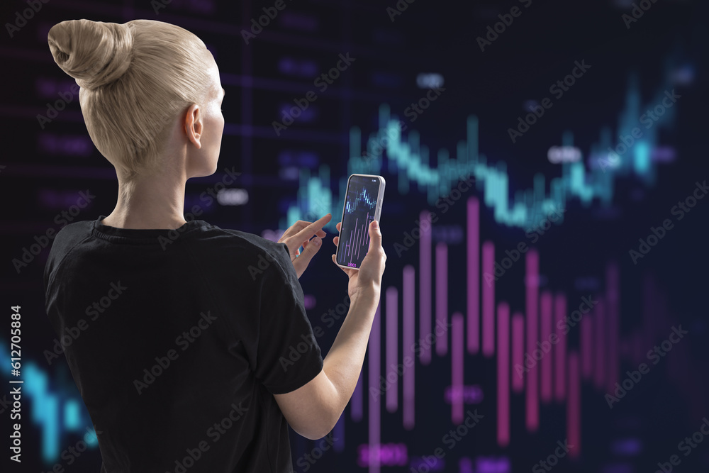 Back view of blonde woman pointing at cellphone with glowing candlestick index forex chart on blurry