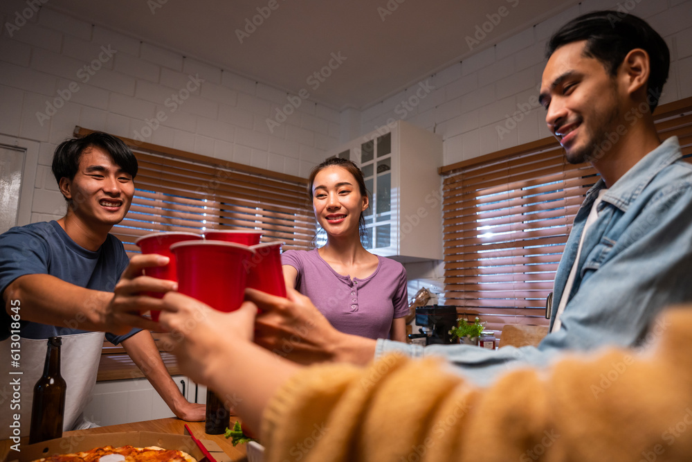 Group of Asian friend having dinner, enjoy evening party together at home. 