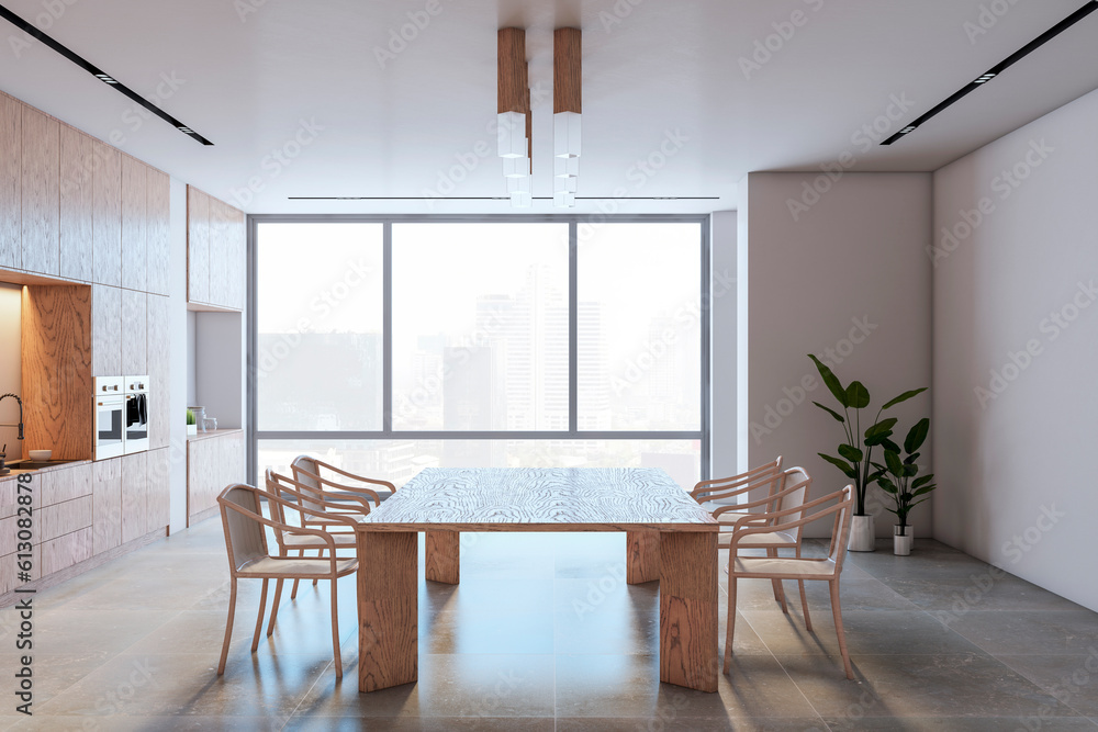 Side view of modern kitchen interior design with wooden dining table with chairs, tiles floor and co