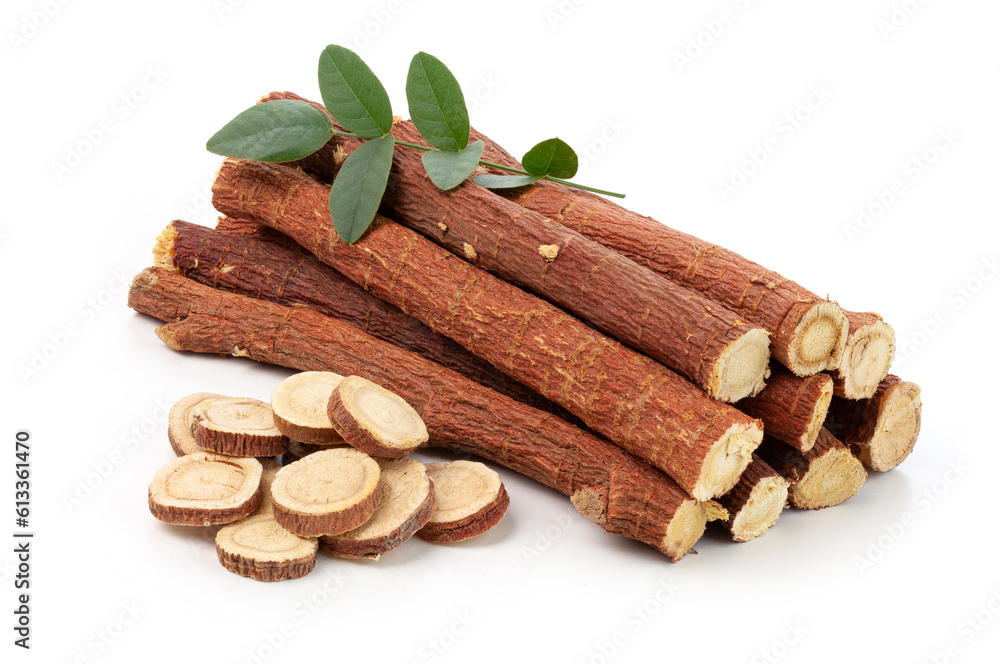 herbal medicine licorice root sticks and slices with leaf isolated on white background.