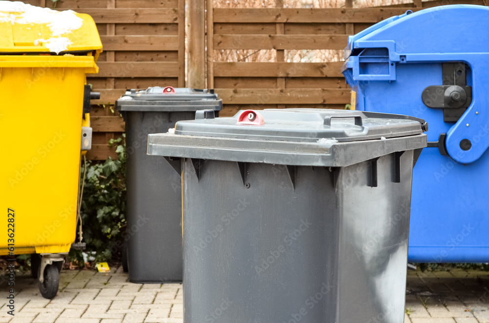 View of garbage container in city on winter day, closeup