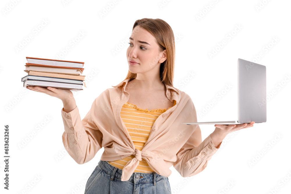 Young woman with laptop and books on white background. Balance concept