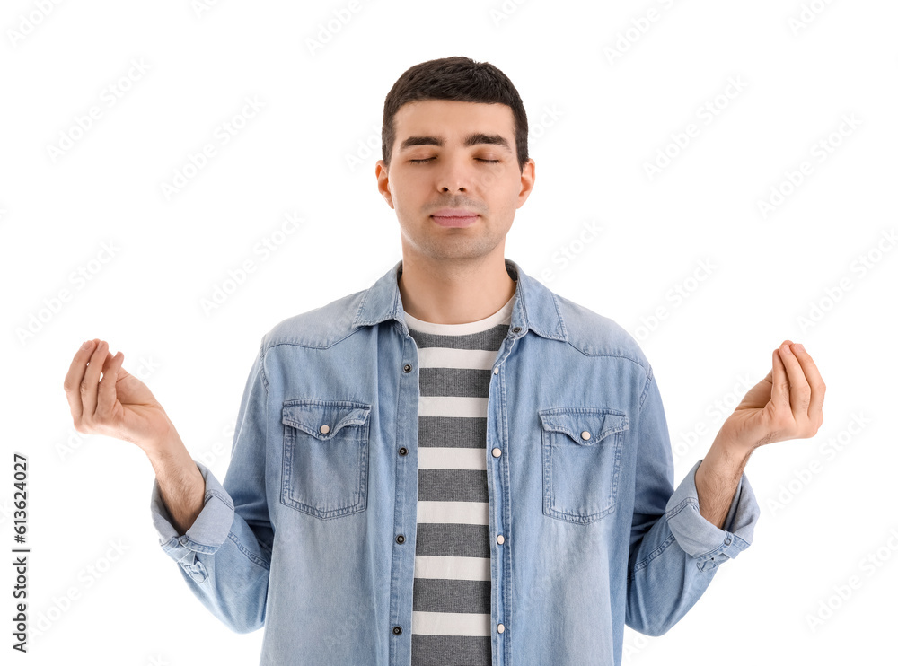 Young man meditating on white background. Balance concept