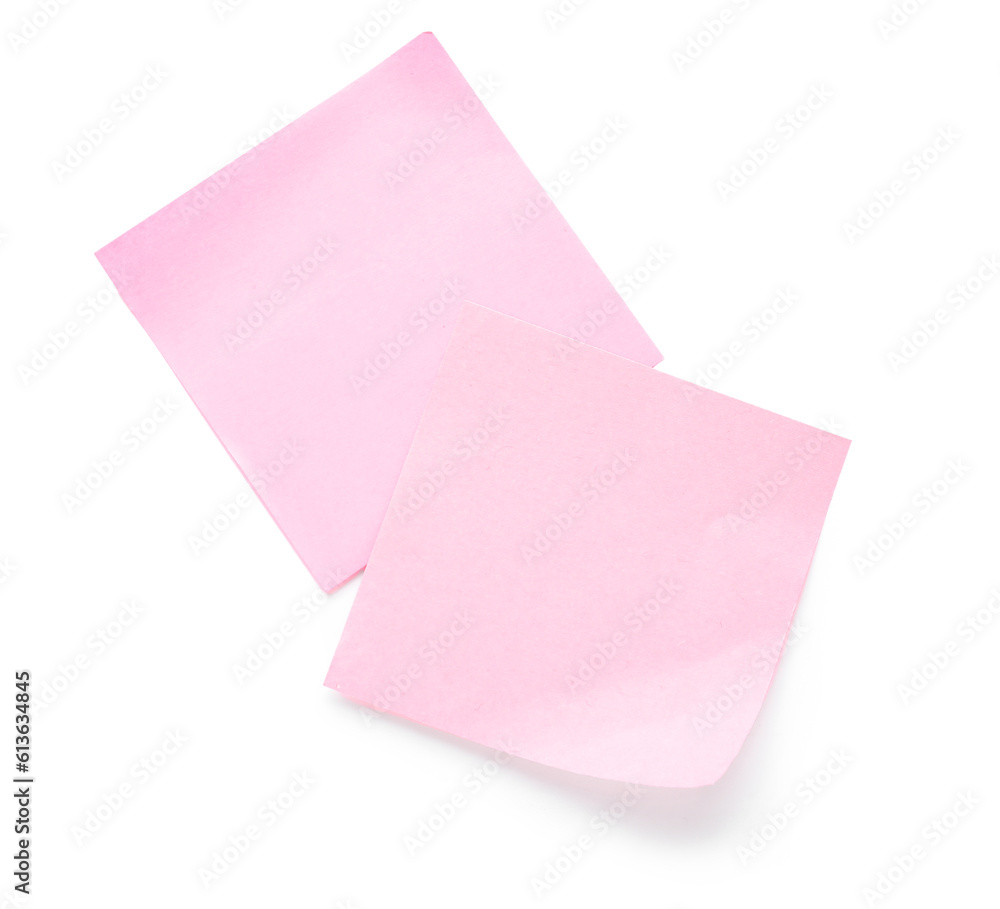 Pink sticky notes isolated on white background