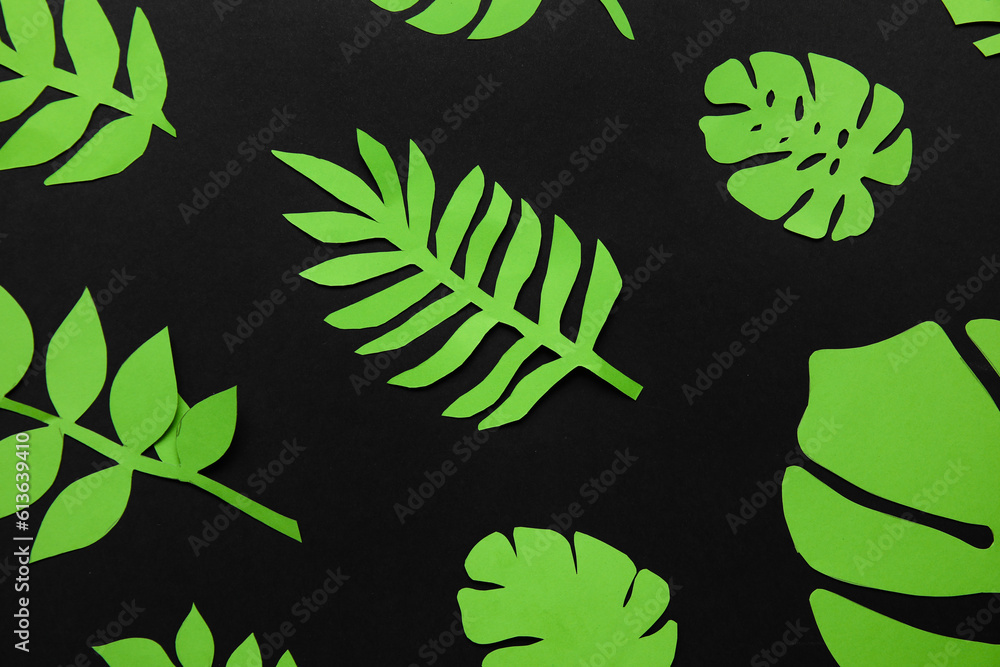 Beautiful origami leaves on dark background