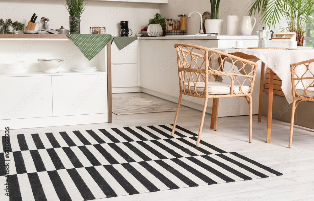 Stylish striped carpet in interior of modern kitchen