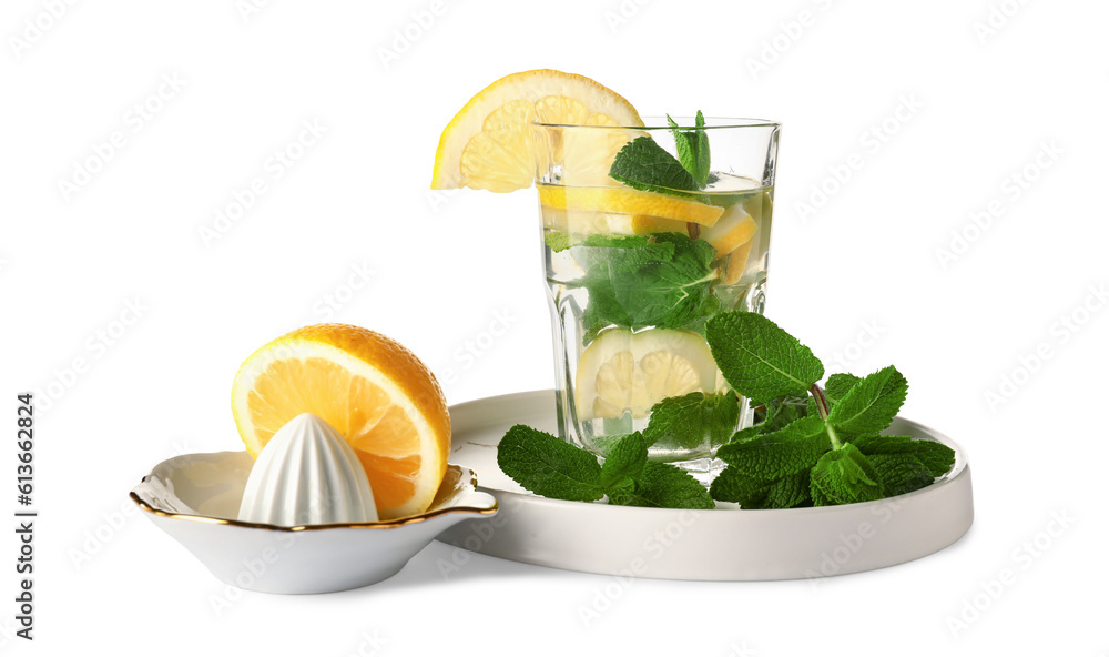 Glass of infused water with lemon and mint on white background