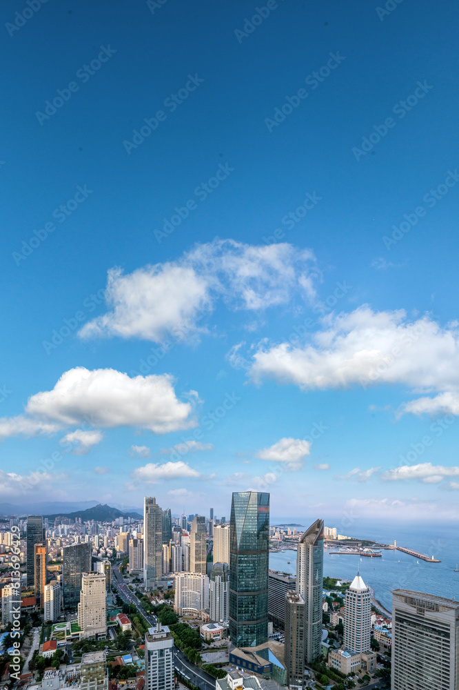 Aerial photography of modern architecture along the urban coastline of Qingdao