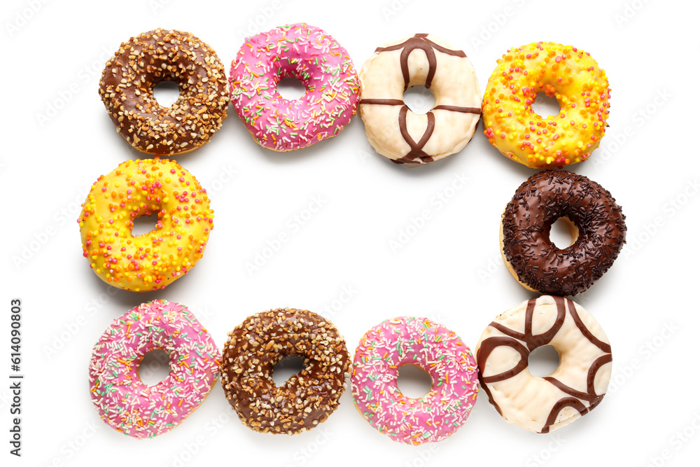 Frame made of sweet donuts on white background