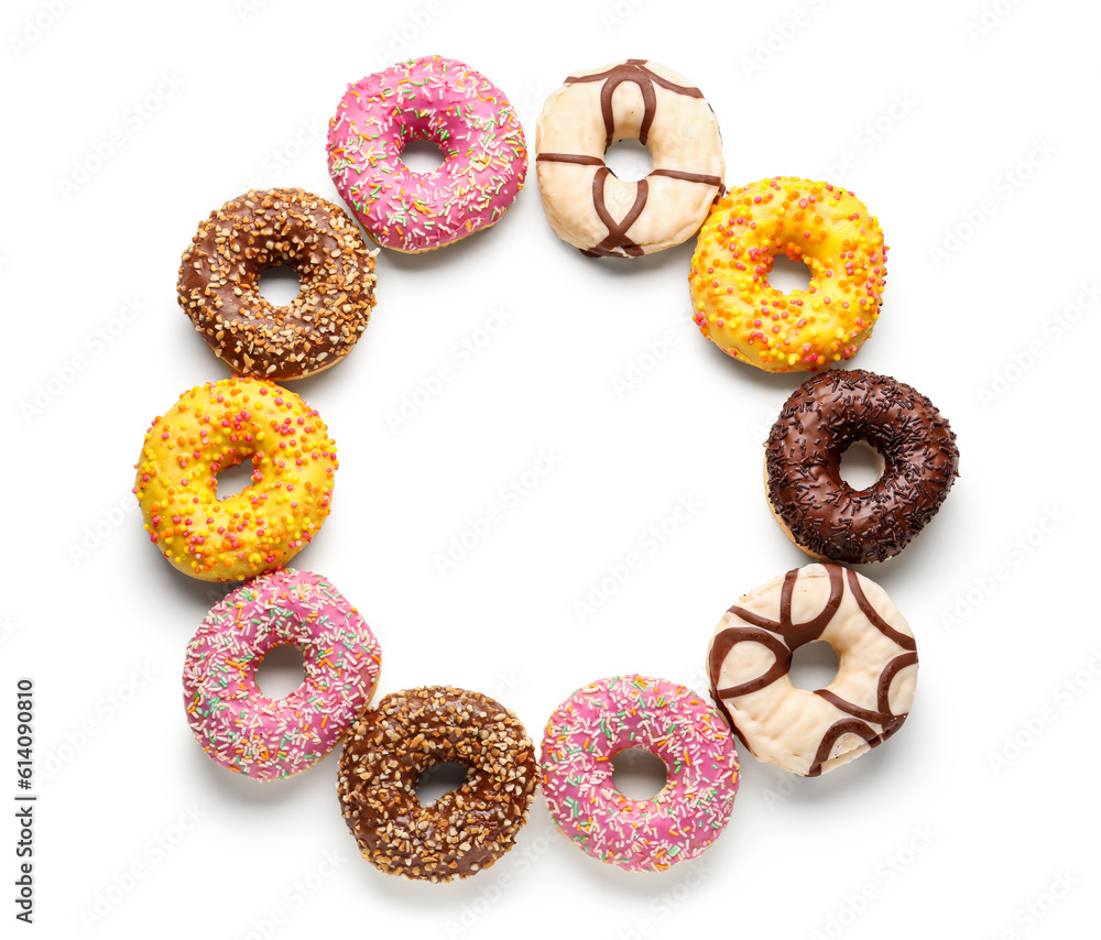 Frame made of sweet donuts on white background