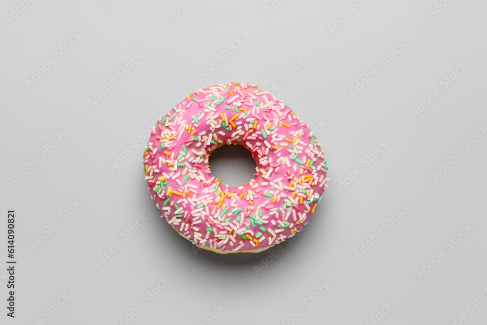 Sweet donut on grey background