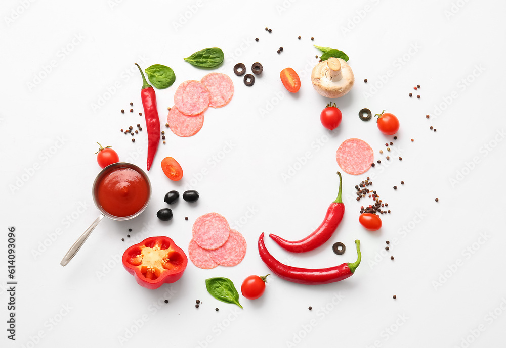 Frame made of fresh ingredients for preparing pizza on white background